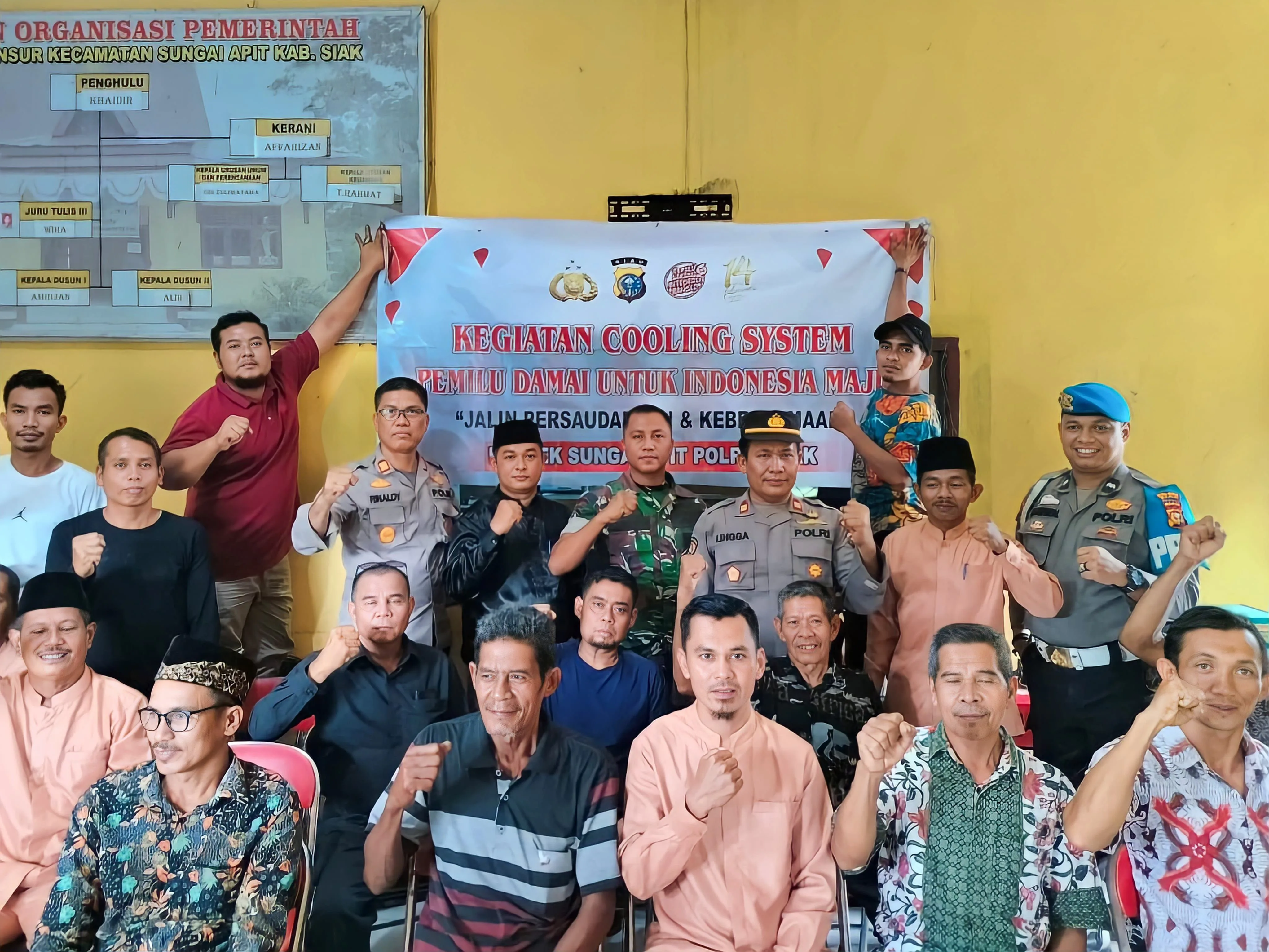 Kapolsek Sungai Apit Laksanakan Cooling System Pemilu Damai 2024 di Kampung Bunsur